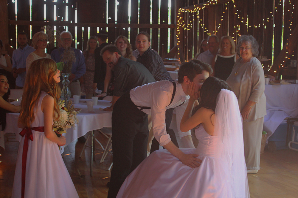 Matt Esckelson Rachel Esckelson kiss photo Northern Michigan wedding Aubrey Ann Parker photography Leelanau County wedding barn wedding