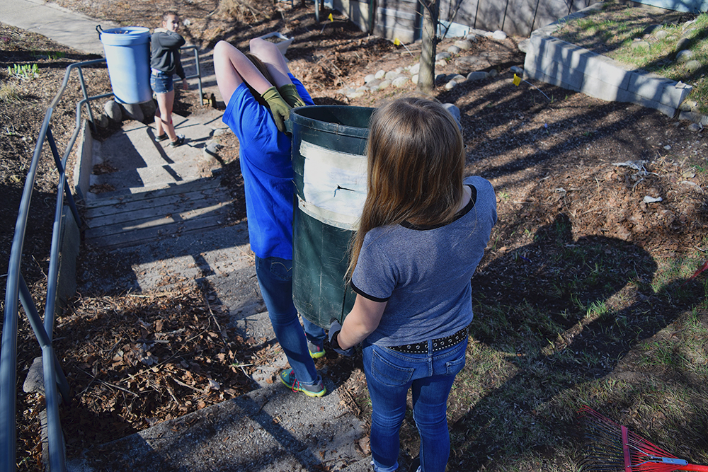 Grow Benzie BCHS Benzie Central High School Girls Varsity Soccer team bonding community raking yard work allie howell allana bostick haley papineau